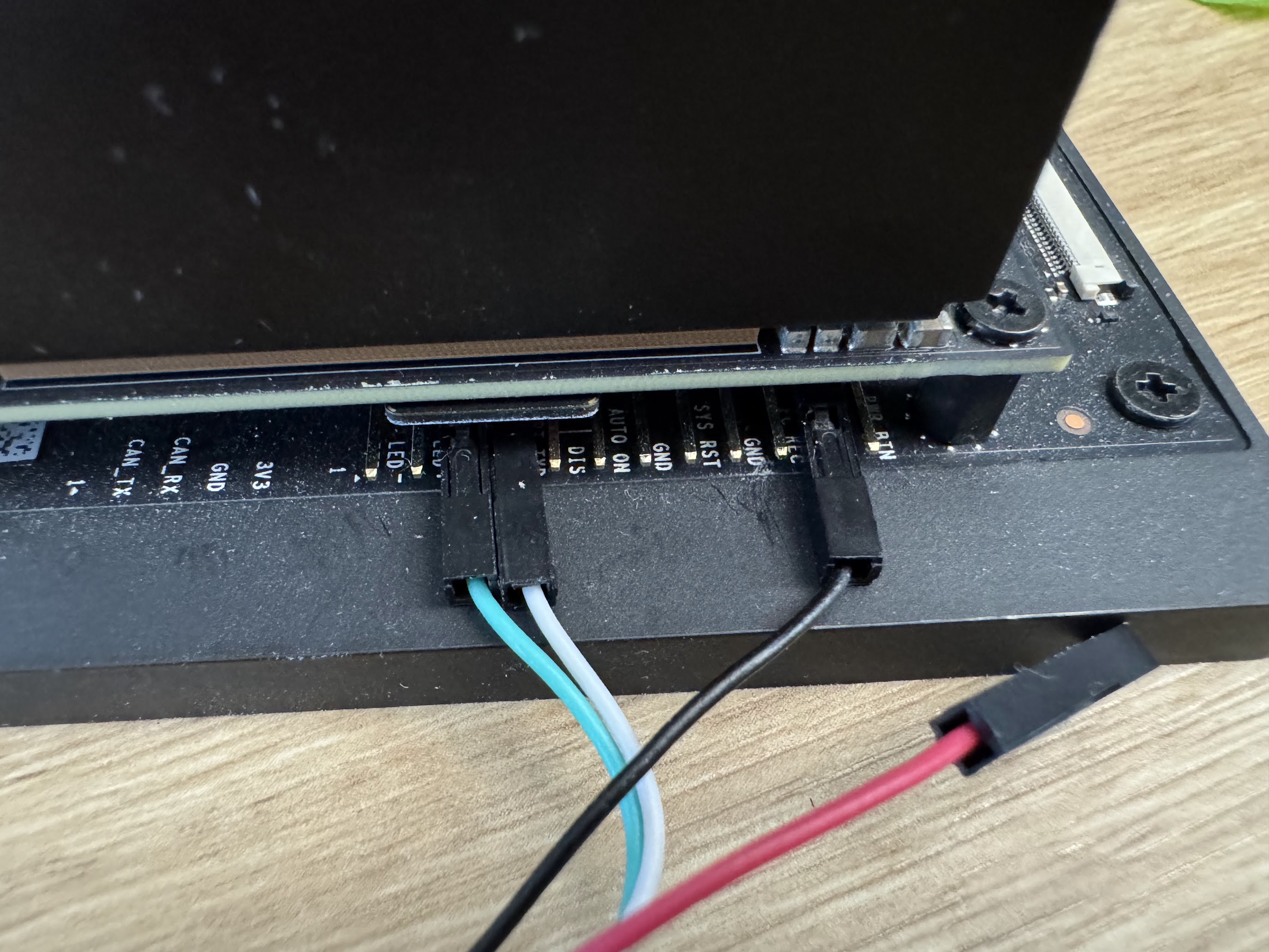 USB-to-TTL serial cable on the Button Header